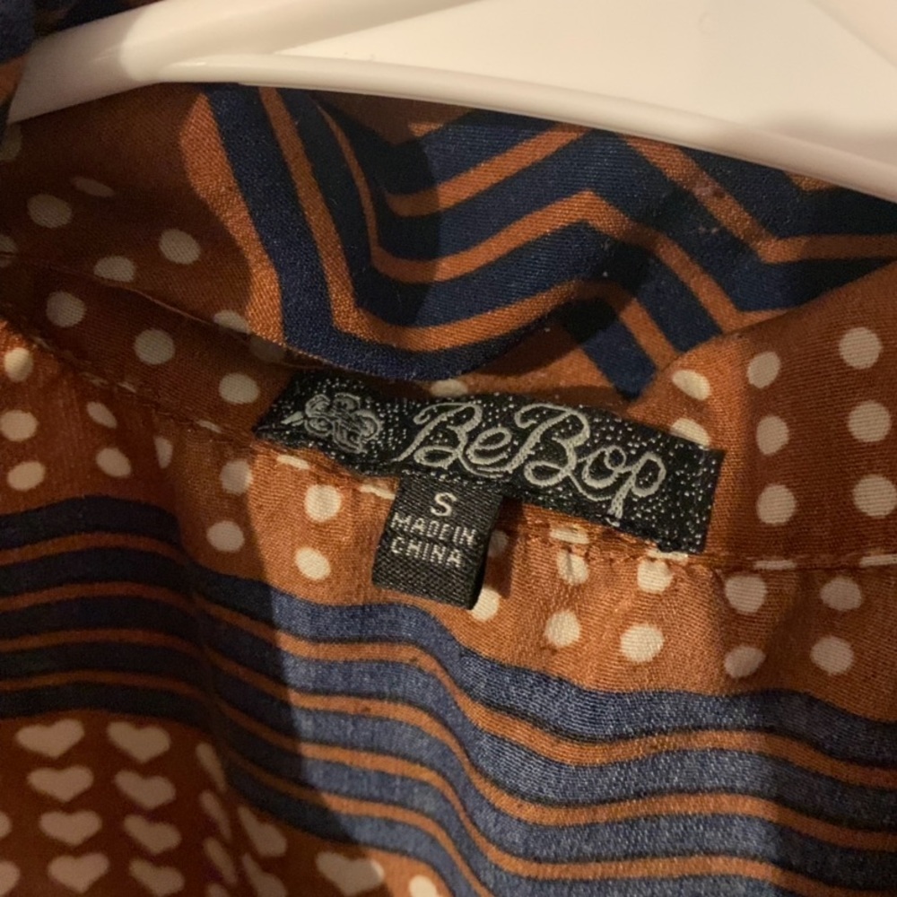 Brown.Different patterned dress